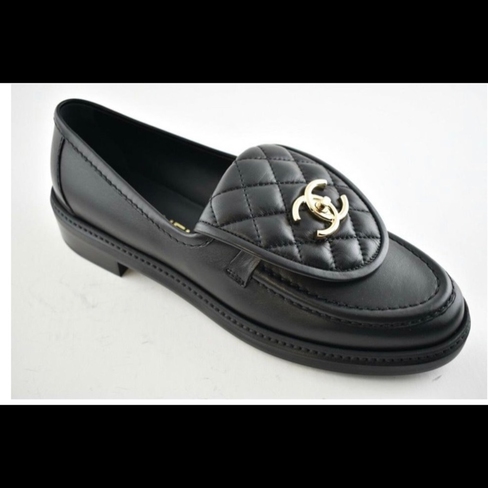 Rare In demand Chanel turn lock loafers